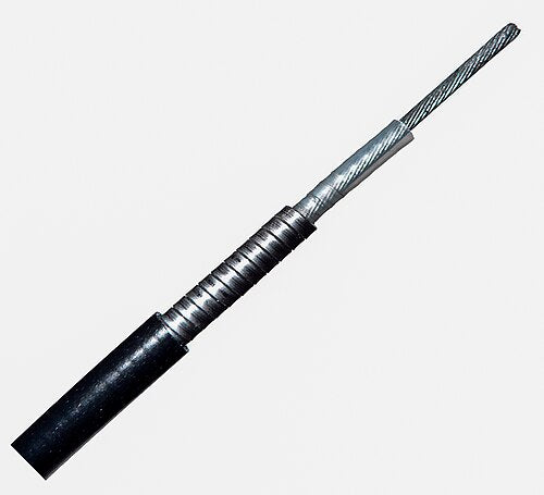 Stepped cutaway of a Bowden control cable showing the outer jacket, steel spiral housing, friction liner, and stranded wire core